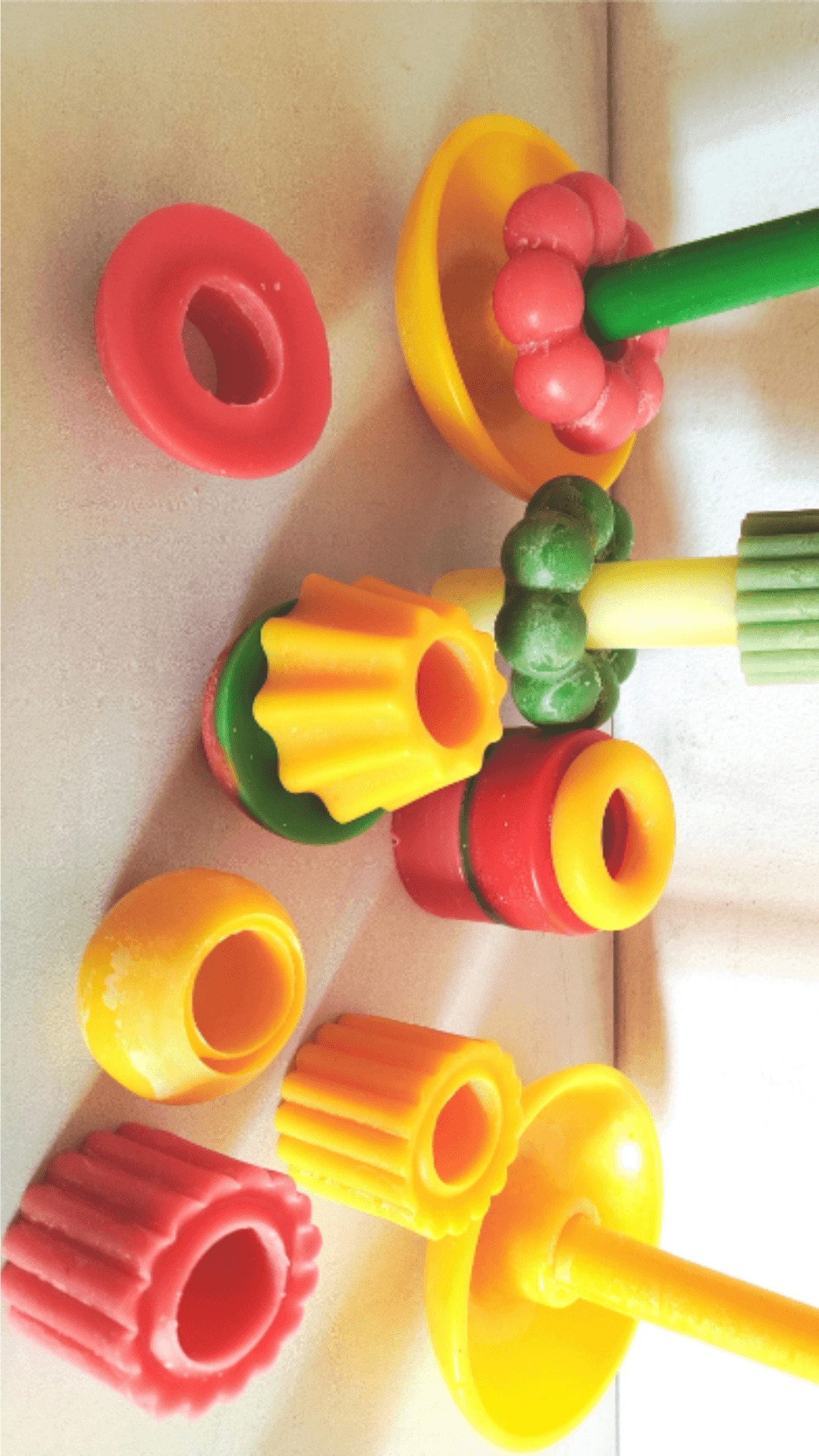 Colorful stackable candle pieces and shapes