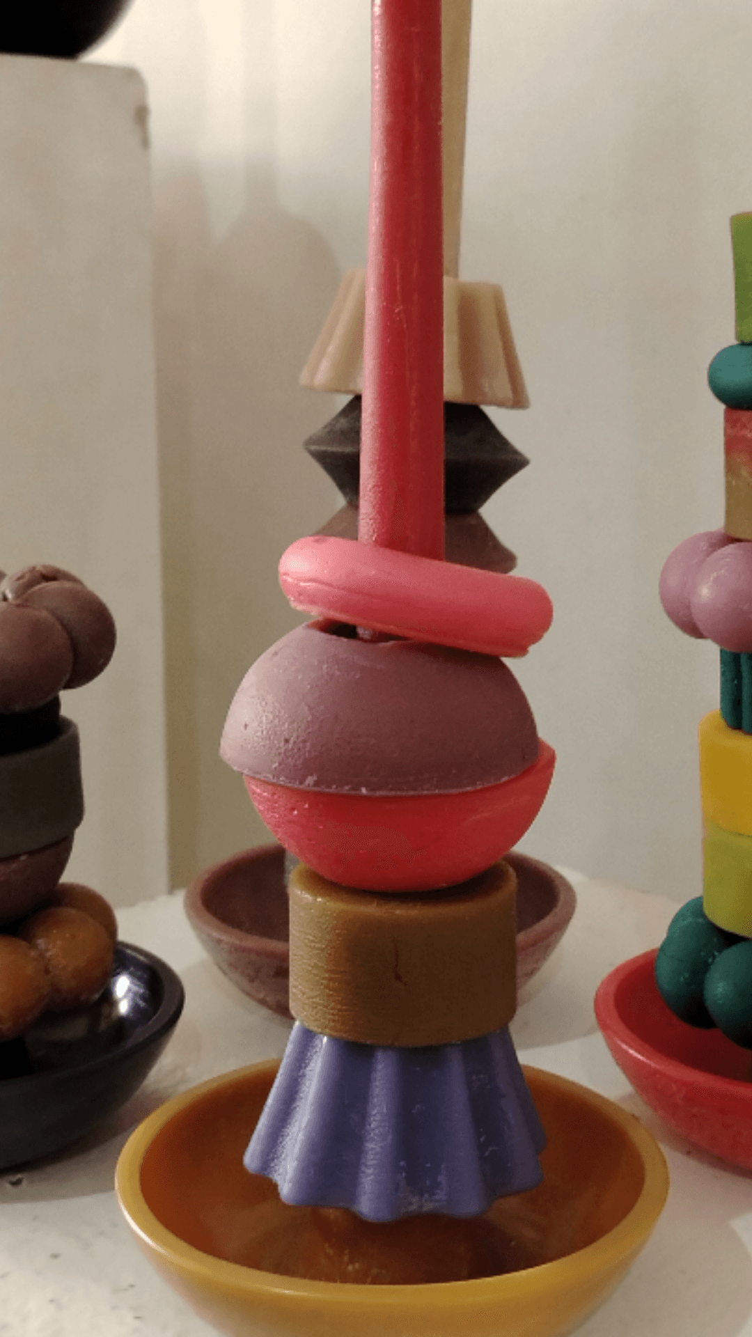 Elegant candle with purple fluted piece